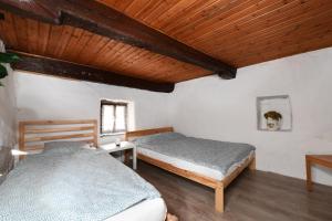 Letto o letti in una camera di Rustic on the Verzasca River