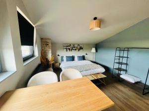 Postel nebo postele na pokoji v ubytování Guesthouse De Polderhoeve