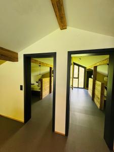 A bed or beds in a room at KWT Lodge