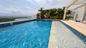 Bazén v ubytování Tu escapada a la mejor playa de Cartagena nebo v jeho okolí