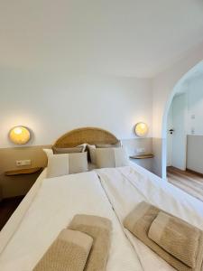 A bed or beds in a room at KWT Lodge