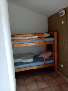 Postel nebo postele na pokoji v ubytování Chalet Chomelix 1 à 4 pers
