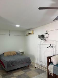 Postel nebo postele na pokoji v ubytování 2 Acogedor y Familiar Departamento c est