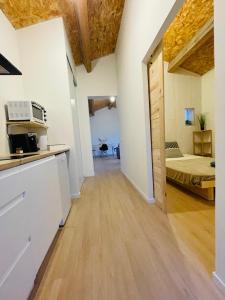 Kuchyň nebo kuchyňský kout v ubytování Maison cocooning au calme