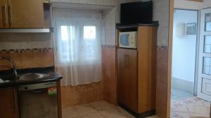 Kuchyň nebo kuchyňský kout v ubytování Casa CLAUDINA