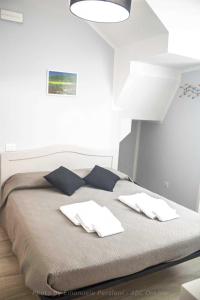 Postel nebo postele na pokoji v ubytování Il corso