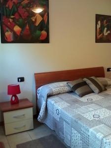 Postel nebo postele na pokoji v ubytování Villa Leilani B&B