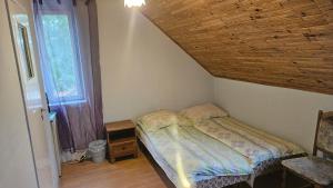 Postel nebo postele na pokoji v ubytování Willa Daniela