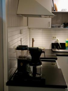 Η κουζίνα ή μικρή κουζίνα στο Central cozy studio with free parking