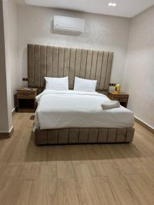 Voodi või voodid majutusasutuse HOTEL BORJ EL ARAB toas