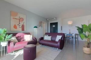 Et opholdsområde på Lake Maggiore 3 bedroom apartment with pool