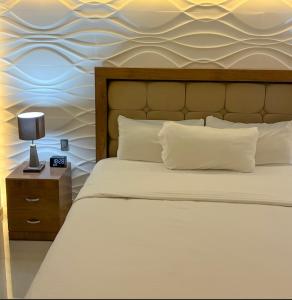 Postel nebo postele na pokoji v ubytování Hotel Arthemisa