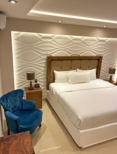 Postel nebo postele na pokoji v ubytování Hotel Arthemisa