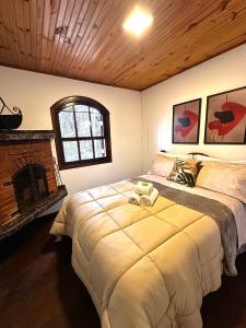 Postel nebo postele na pokoji v ubytování Villaggio Harmonia Monte Verde