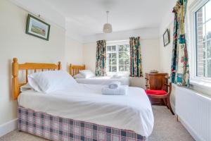 Postel nebo postele na pokoji v ubytování Field House