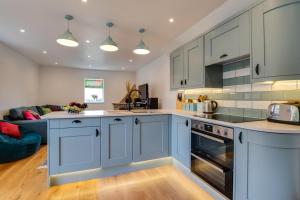 Køkken eller tekøkken på The Barn @ Swanage Farm