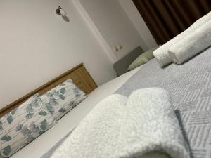 Postel nebo postele na pokoji v ubytování Markovi Apartments