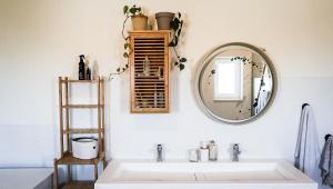 a bathroom with a sink and a mirror at Hilltop Boutique Stay with Sea View in Ferrel +19 photos