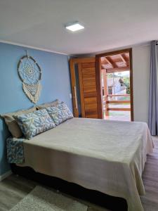 Una cama o camas en una habitación de DUPLE Suy