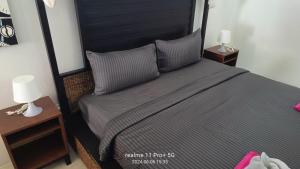 Postel nebo postele na pokoji v ubytování Blue Haven Bay Villa 21C