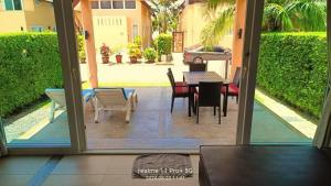 Patio nebo venkovní prostory v ubytování Blue Haven Bay Villa 21C