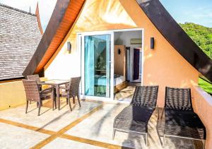 Balkón nebo terasa v ubytování Blue Haven Bay Villa 21C