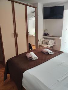 Кровать или кровати в номере Apartments Grubelić - Perfect for Families and Small Groups