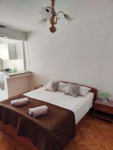 Кровать или кровати в номере Apartments Grubelić - Perfect for Families and Small Groups