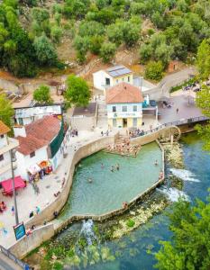 a group of people in a pool in a river at Casa da Lameira in Serra