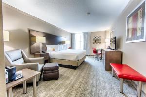 Ένα ή περισσότερα κρεβάτια σε δωμάτιο στο Hotel Capstone +21 φωτογραφίες