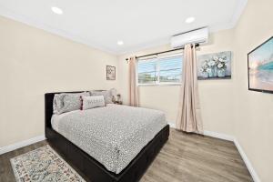 Ένα ή περισσότερα κρεβάτια σε δωμάτιο στο Elegant Exclusive Escape In Downtown Los Angeles