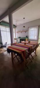 a large room with a large table in the middle at Flow De Lupe in Brisas de Zicatela