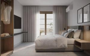 Postel nebo postele na pokoji v ubytování Pyreneus Residence