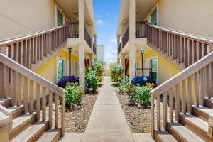 a walkway between two apartment buildings at Escape Condominiums #2 in South Padre Island