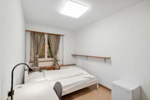 Postel nebo postele na pokoji v ubytování betahouse Self-Check In Hostel