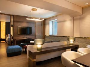 Postel nebo postele na pokoji v ubytování Sofitel Athens Airport