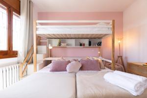 a bedroom with two bunk beds in a room at Villa Carmen - Peaceful Eco-Luxury with private pool in Cunit +106 photos