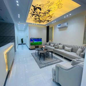 Χώρος καθιστικού στο شقق فندقية جديدة متعددة الاحجام ديكور فخم مدخل ذكي