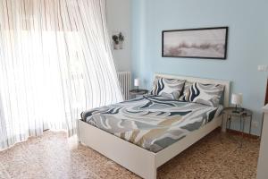 Postel nebo postele na pokoji v ubytování Casa De Gregorio