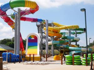 a water park with a colorful water slide at Bear Cabin-3 BR 2 Bath with Indoor Hot tub-one level-Pool Pass-Pet welcome in McGaheysville