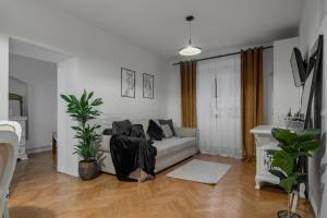 Un pat sau paturi într-o cameră la Valentina's Hideaway
