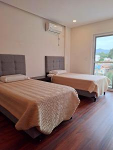 Ένα ή περισσότερα κρεβάτια σε δωμάτιο στο El Molino Apartment
