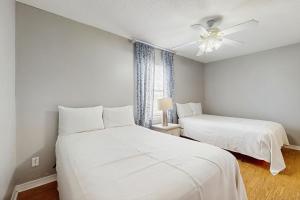 Postel nebo postele na pokoji v ubytování Moonraker 22 + 17 fotografií