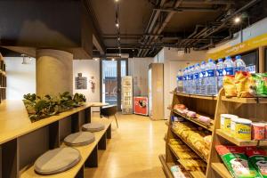 a grocery store aisle with shelves of food at BSR Luxe Studio next to Allianz Park w Rooftop Pool and Pet Friendly in São Paulo