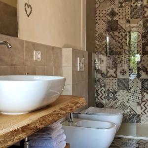 Koupelna v ubytování Il cuore dei Foresti