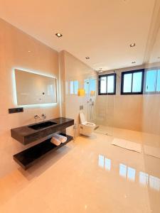 a bathroom with a sink and a toilet at Villa Patel in Marrakesh +19 photos