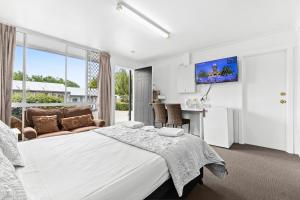 Postel nebo postele na pokoji v ubytování Alexander Motel