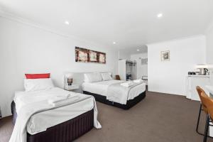 Postel nebo postele na pokoji v ubytování Alexander Motel