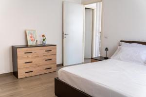 Katil atau katil-katil dalam bilik di Attico con Terrazzo