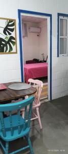 En eller flere senge i et værelse på Estúdio Casa do Tamarineiro